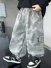 Pantalones Camuflados con Cremallera para Niños Primavera y Otoño 2026 Nuevo Estilo Pantalones Casuales Elegantes y Geniales para Niños Pequeños Comercio Exterior