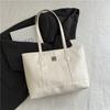 Bolsa Tote de Grande Capacidade para Mulheres 2025 Nova Moda Simples Bolsa de Mão Embossada Casual para Trabalho Roupa Bolsa de Ombro Axilar
