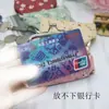 Nuevo monedero pequeño de tela fresca estampado a cuadros billetera corta pequeña bolsa de boca dorada souvenirs turísticos al por mayor