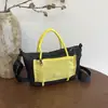 Bolso de hombro cruzado versátil y simple a cuadros para mujer, nuevo 2026, gran capacidad, para el trabajo, un bolso elegante y versátil