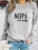 Europa y Estados Unidos transfronterizo otoño e invierno mujer casual manga larga cuello redondo NOPE eslogan estampado suéter sudadera explosión