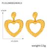 Europa y Estados Unidos venta caliente transfronteriza talla anillo aretes de flor hueca acero titanio chapado oro 18K aretes exagerados joyería mujer