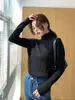 Suéter base de punto versátil de color liso con cuello alto, nuevo estilo otoño e invierno 2026, suéter de punto de algodón coreano ajustado con diseño calado para mujer