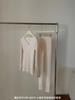 Traje de lana de oveja de otoño e invierno de la sociedad coreana, sensación ligera, fiebre, levantamiento de cadera, barriga, sin costuras, ropa interior térmica agradable para la piel, ropa y pantalones de otoño para mujer