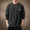 Camiseta de manga larga de alta gama para hombre, informal y de corte holgado, nueva camiseta básica de cuello redondo para hombre Otoño 2026, top