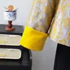 Novo casaco de outono estilo chinês para mães, moderno e elegante, com gola redonda e botões de nó chinês tradicionais, perfeito para mulheres de meia-idade e idosas na primavera e no outono