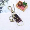 Estilo Punk Retro Cuero Bronce Antiguo Llavero de Coche para Hombre Regalo Pequeño Creativo Hecho a Mano de Cuero Venta al por Mayor