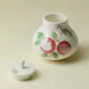 Rinno Gui Song Cerámica Porcelana Transparente Esmalte Bajo Pastel Lichi Mini Recipiente para Té Sellado Creativo de Alto Valor Recipiente a Prueba de Humedad