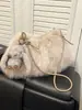 Yozzi 2026 principios de otoño nuevo versátil casual simple peludo moderno elegante bolsa de hombro para axila de gran capacidad