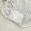 2025 Nova Roupa Íntima Feminina de Cintura Média Fofa Calcinhas Femininas Sem Costura Levantamento de Quadril 3D Cor Sólida Roupa Íntima de Nuvem em Estoque