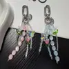 Colgante Único de Tulipán y Mariposa con Cuentas de Nuevo Estilo para Mujer, Funda de Teléfono Creativa y Encanto para Bolso