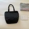 Nova Bolsa de Lona Casual Simples Estilo Coreano Ins Feminina Grande Capacidade Bolsa Tote para Estudante Deslocamento Bolsa de Ombro Único 2026