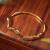 Pulsera abierta Xiangxu dorada amarilla verde con forma de serpiente para mujer pulsera de serpiente exótica blanca popular Joker ventas directas de fábrica