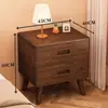 Mesita de noche de madera maciza para dormitorio del hogar 2026 Venta caliente Creativa Pequeño Armario de almacenamiento simple para niños Mesita de noche de tronco