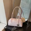 Moda Transfronteriza Versátil Exquisito Diseño de Nicho Verano 2026 Nuevo Bolso de Hombro Baguette de Alta Gama para el Trabajo