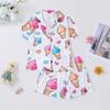 Conjunto de pijama infantil estampado para meninas de meia-idade, novo, para exportação transfronteiriça, ideal para todas as estações. Inclui shorts de manga curta, cardigã e muito mais.