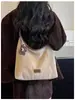 Bolso grande de mujer retro, nuevo bolso de moda de ante tipo albóndiga para el otoño de 2026, bolso cruzado informal para el día a día