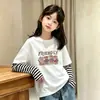 Camiseta para Niña 2026 Primavera/Otoño Nuevo Estilo Moda Infantil Dibujos Animados Top para Niños Mayores Algodón Puro Falso Dos Piezas Manga Larga Capa Base