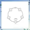 Pulseira de trevo de quatro folhas e cinco flores, versão em molde de aço, ouro V, padrão de flor padrão, não ultrafina, banho de ouro 18k espesso, luxo leve, transmissão ao vivo