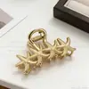 Pinza para el pelo de alta gama transfronteriza europea y americana, serie oceánica, estilo nuevo simple y único, estrella de mar, concha y caracola