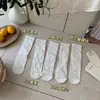 Calcetines songmu blancos de media pantorrilla para mujer, finos de verano, malla hueca, transpirables, calcetines holgados, calcetines dulces estilo JK japonés