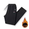 Pantalones de chándal de cordero con forro polar Ropa exterior engrosada Pantalones casuales cálidos Ropa exterior Pantalones deportivos para hombre 2024 Nuevo Invierno