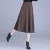 Saia evasê casual da moda estilo coreano para mulheres, novidade outono 2026 cintura alta emagrecedora saia de caimento para o trabalho