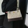 Bolsa estilo Chanel pequena feminina 2026 novo estilo bolsa balde super quente grade de diamantes corrente bolsa de lona versátil ombro único transversal