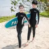 Traje de baño Pantalones de manga larga para niños y niñas Nuevo Protección solar Secado rápido Traje de buceo dividido Traje de baño