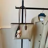 Bolso de hombro para mujer de gran capacidad, elegante, sencillo y elegante, nueva versión coreana temporada 2026, bolso tote cruzado para debajo del brazo para ir al trabajo