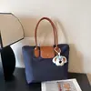 2026 Nueva Moda Popular Elegante Estilo Coreano Personalidad Ins Bolso Casual Bolso Tote de Hombro Axila Bolso Cruzado para Mujer