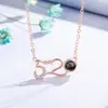 Versión coreana de collar de 100 idiomas Te amo para mujer con proyección tremolo cadena de clavícula joyería de moda