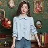 Nova Blusa Curta Feminina Chic Doce Nicho com Design de Gola Boneca Franzida Estilo Francês para Primavera e Outono de 2025