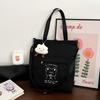 Bolso Sencillo de Otoño e Invierno Nuevo Estilo Bolso de Lona Texturizado y Atmosférico para Mujer 2023 Mochila Escolar para Estudiante Bolso de Mano de Dibujos Animados