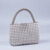 Bolso de mano para mujer con cuentas plateadas explosivas personalizadas y acrílico transparente tejido a mano.