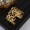 Pulsera Ancha de Acero Inoxidable con Diseño de Cruz Personalizado Rama Exagerada para Mujer Chapada en Oro de 18K Joyería de Acero de Titanio Prensado en Aceite