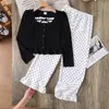 Conjunto de Dos Piezas para Niña Bestseller Transfronterizo 2026 Moda Estampado de Lunares Patchwork Lazo Encaje Top y Pantalones Largos para Niños