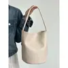 Bolsa de Couro Macio Estilo Cesta de Legumes Feminina Verão 2024 Nova Bolsa de Mão de Nicho Bolsa de Ombro Bolsa de Ombro para o Dia a Dia