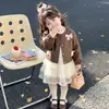 Conjunto de Chaqueta de Cuero con Lazo y Falda de Tul para Niñas 2026 Otoño Nuevo Estilo Coreano Conjunto de Dos Piezas Moderno Ropa Infantil