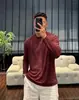 Novo modelo do fabricante original: Camiseta masculina de manga longa feita de Lyocell Tencel, com um design de malha de cor sólida, gola redonda, fresco e respirável