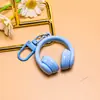 Nuevo llavero creativo de auriculares 3D, un accesorio moderno y genial para bolsos, joyería hecha a mano para manualidades y materiales para accesorios, al por mayor