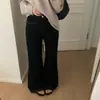 Foto real de los nuevos jeans acampanados de lavado simple de alta gama para mujer de Dongdaemun, Corea, otoño 2026