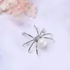 Broche de araña europeo y americano transfronterizo lindo animal corsage de alta gama pasador de alta gama accesorios para ropa al por mayor