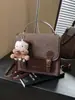 Bolsas Femininas Transfronteiriças Outono e Inverno 2026 Bolsas de Luxo Bolsas de Mão de Nicho Mochilas de Nova Moda Bolsas Quadradas Pequenas