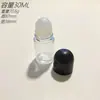 Fabricante de botella de vidrio rollerball redonda corta versión Q, engrosada, de 30 ml, en stock