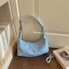 Bolso de hombro con remaches transfronterizos para debajo del brazo 2026 nuevo otoño e invierno versátil retro bolso de hombro nicho elegante bandolera tipo bollo