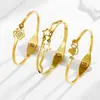 Fábrica en stock al por mayor moda coreana personalidad simple titanio mariposa pulsera hebilla de resorte diseño chapado 18k