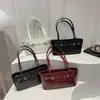 Bolso de hombro de nicho de alta gama para mujer 2025 nuevo de moda simple versátil bolso de axila para el trabajo bolso de mano pequeño