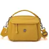 Bolsas para Mulheres 2025 Nova Mini Bolsa de Mão Fashionable Casual Bolsa de Ombro em Tecido Oxford Simples Bolsa Transversal de Lona