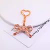 Llavero de lazo estampado con forma de corazón + figura de 8 Accesorios para muñeca de cuentas hecha a mano para colgar Materiales
